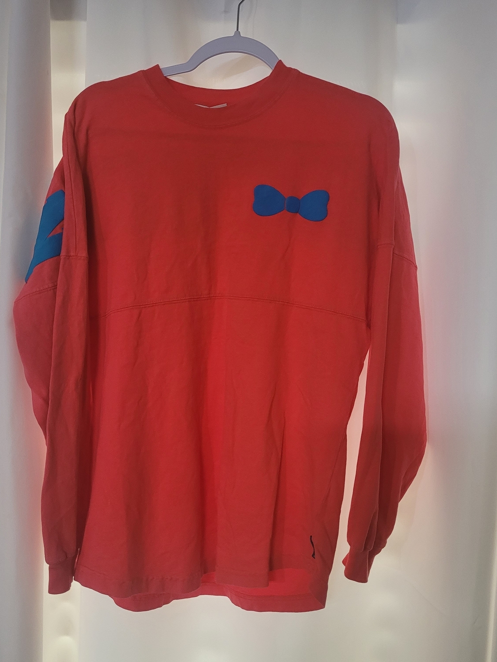 Spirit Red Long Sleeve Tee with Blue Bow Accent